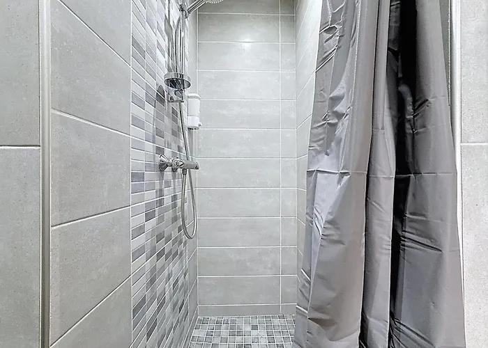 Апартаменты Lumineux En Rez-de-chaussee Vers Chu *